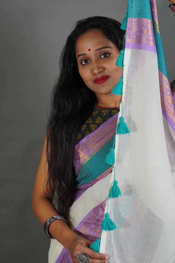 Elegant Off-White Cotton Silk Saree with Border and Tassels