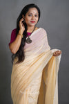 Soft Cream Handloom Cotton Saree with Golden Stripe Detailing & Tassels