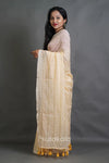 Soft Cream Handloom Cotton Saree with Golden Stripe Detailing & Tassels