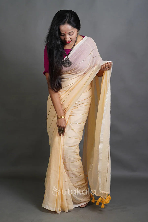 Soft Cream Handloom Cotton Saree with Golden Stripe Detailing & Tassels
