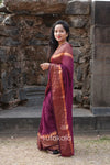 Purple Malmal Cotton Saree with Golden Striped Border