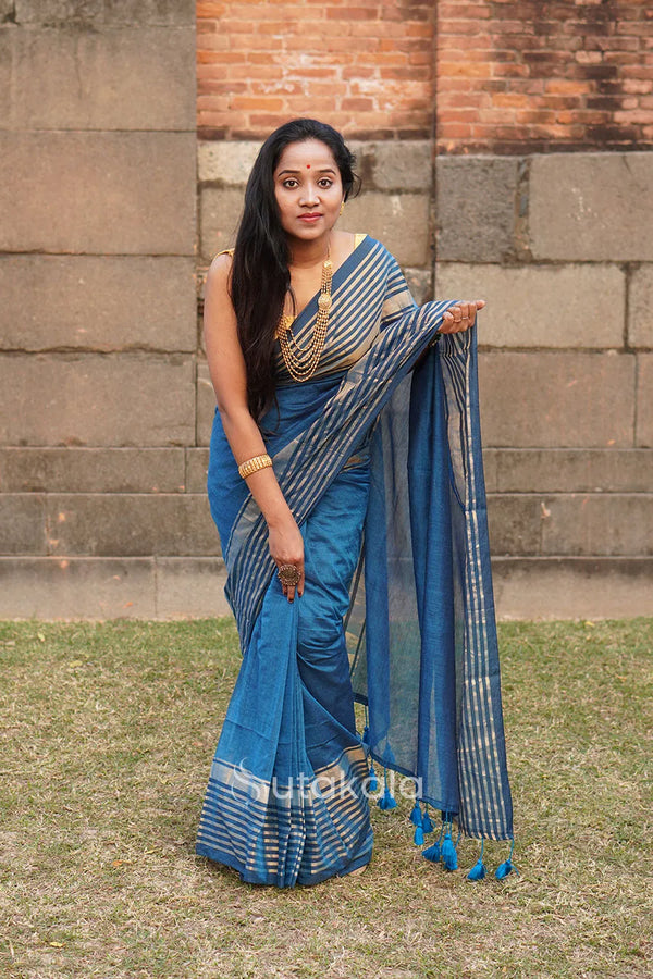 Blue Malmal Cotton Saree with golden Striped Border