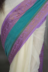 Elegant Off-White Cotton Silk Saree with Border and Tassels