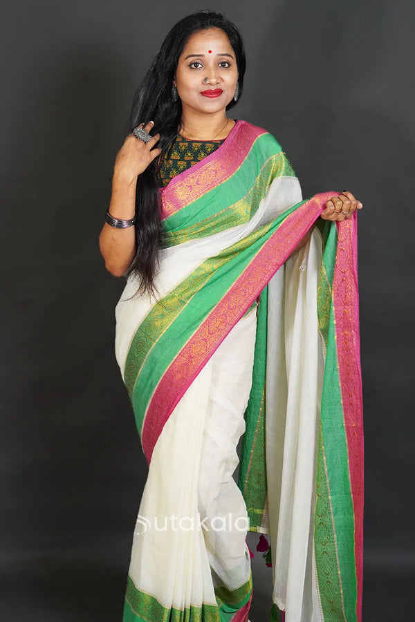 Elegant Off-White Cotton Silk Saree with Zari Border and Tassels