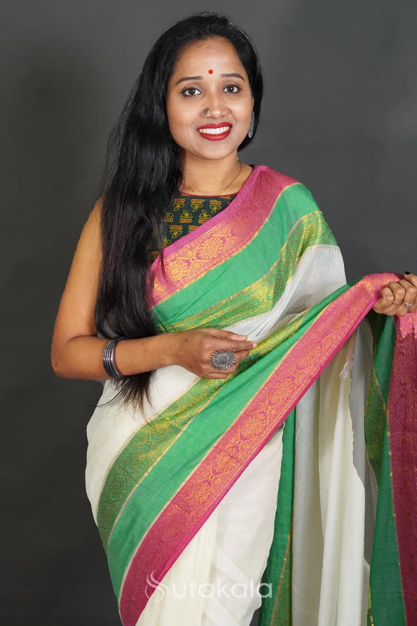 Elegant Off-White Cotton Silk Saree with Zari Border and Tassels
