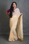 Soft Cream Handloom Cotton Saree with Golden Stripe Detailing & Tassels