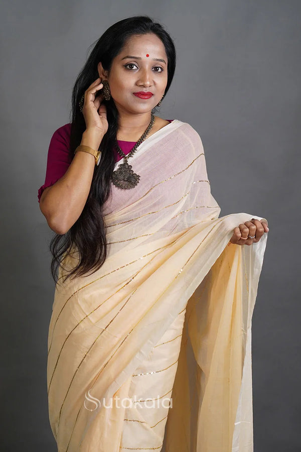 Soft Cream Handloom Cotton Saree with Golden Stripe Detailing & Tassels