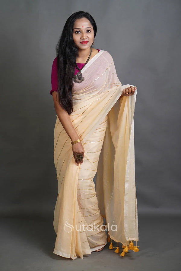 Soft Cream Handloom Cotton Saree with Golden Stripe Detailing & Tassels