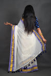 Off-White Cotton Saree with Blue Border & Elegant Thread Work
