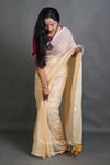 Soft Cream Handloom Cotton Saree with Golden Stripe Detailing & Tassels