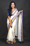 Off-White Cotton Saree with Blue Border & Elegant Thread Work